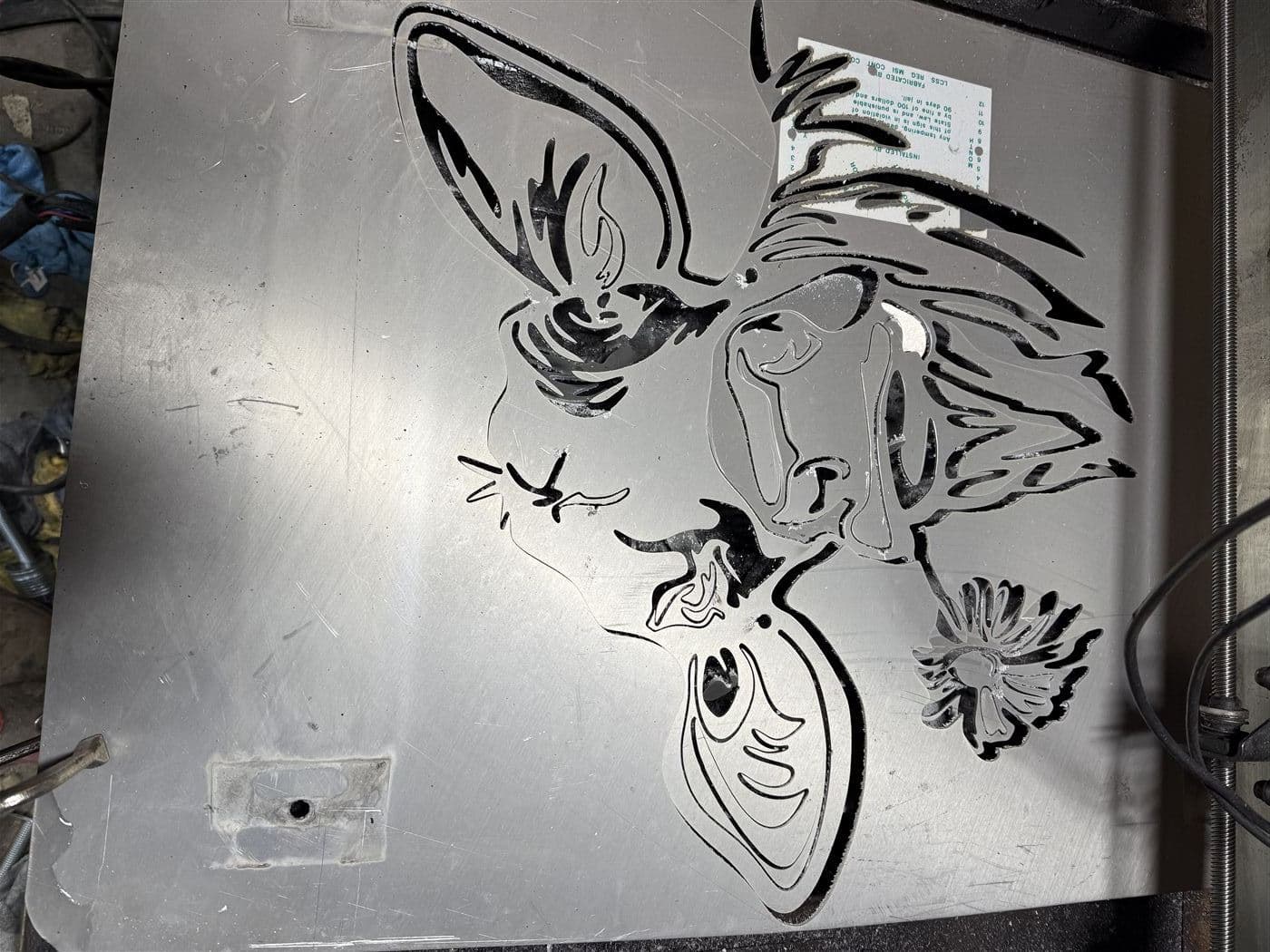 Cow & daisy, cut in aluminum